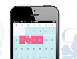 Immagine di un cellulare che mostra un calendario mestruale. La foto mostra come appare l’Applicazione Calendario Mestruale o.b.®.